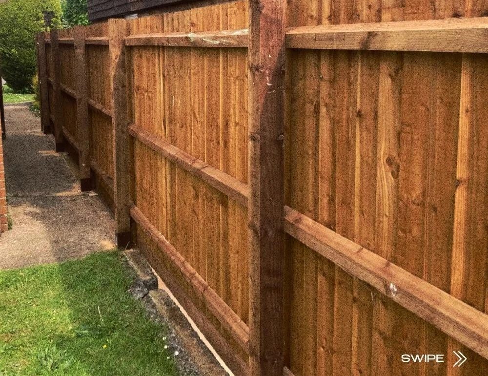 Rear fence rails and timber boards by Boothville Services.