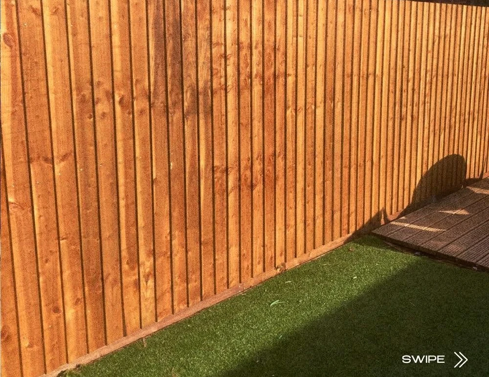 New timber fence bordering a lawn by Boothville Services.