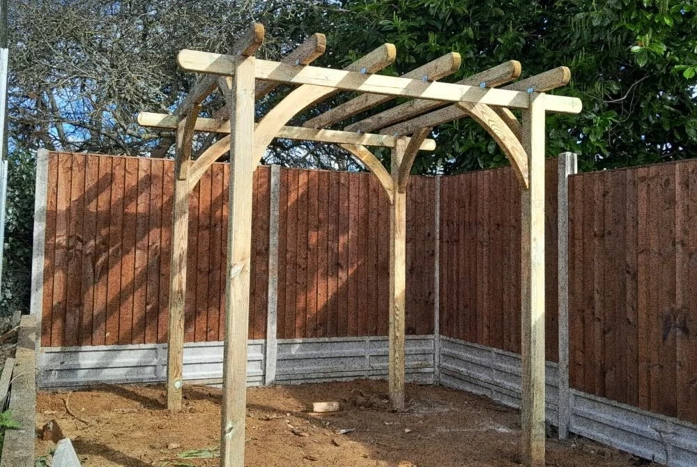 Timber pergola frame during construction by Boothville Services.