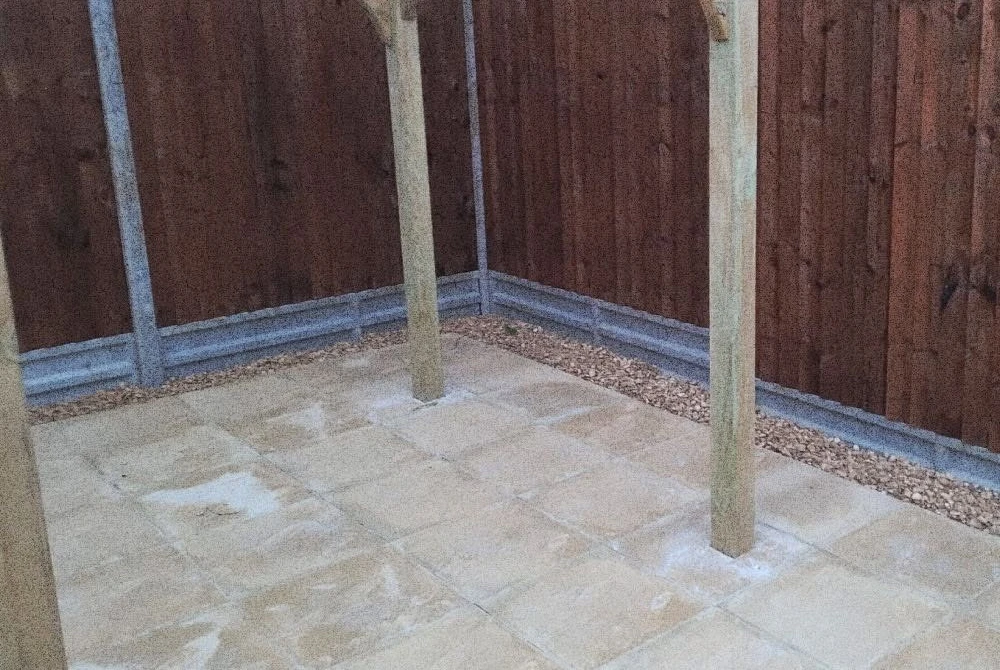 Completed timber pergola over a paved patio by Boothville Services.